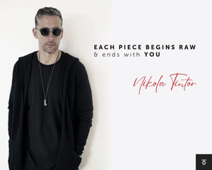 Nikola Tintor, founder of ToTintor Jewelry, wearing handcrafted 925 sterling silver jewelry with raw crystals, inspired by music, emotion, and artistic identity.