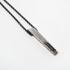 Close-up of Sterling Silver Talisman Necklace with Verdelite Gemstone