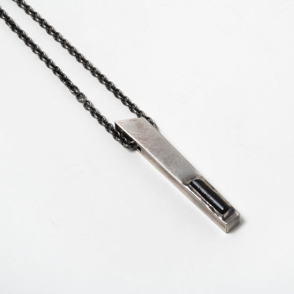 Close-up of Sterling Silver Talisman Necklace with Verdelite Gemstone