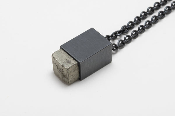 TALISMAN NECKLACE IN BLACK MATTE STERLING SILVER WITH PYRITE