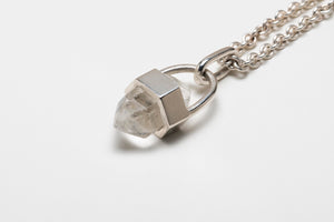Silver pendant with clear quartz crystal in hexagon setting