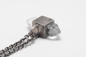 Double terminated quartz in gray silver cap